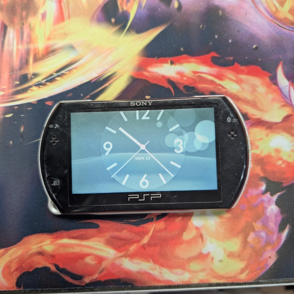 Sony PSP Handheld Gaming Console - Black with Silver Trim